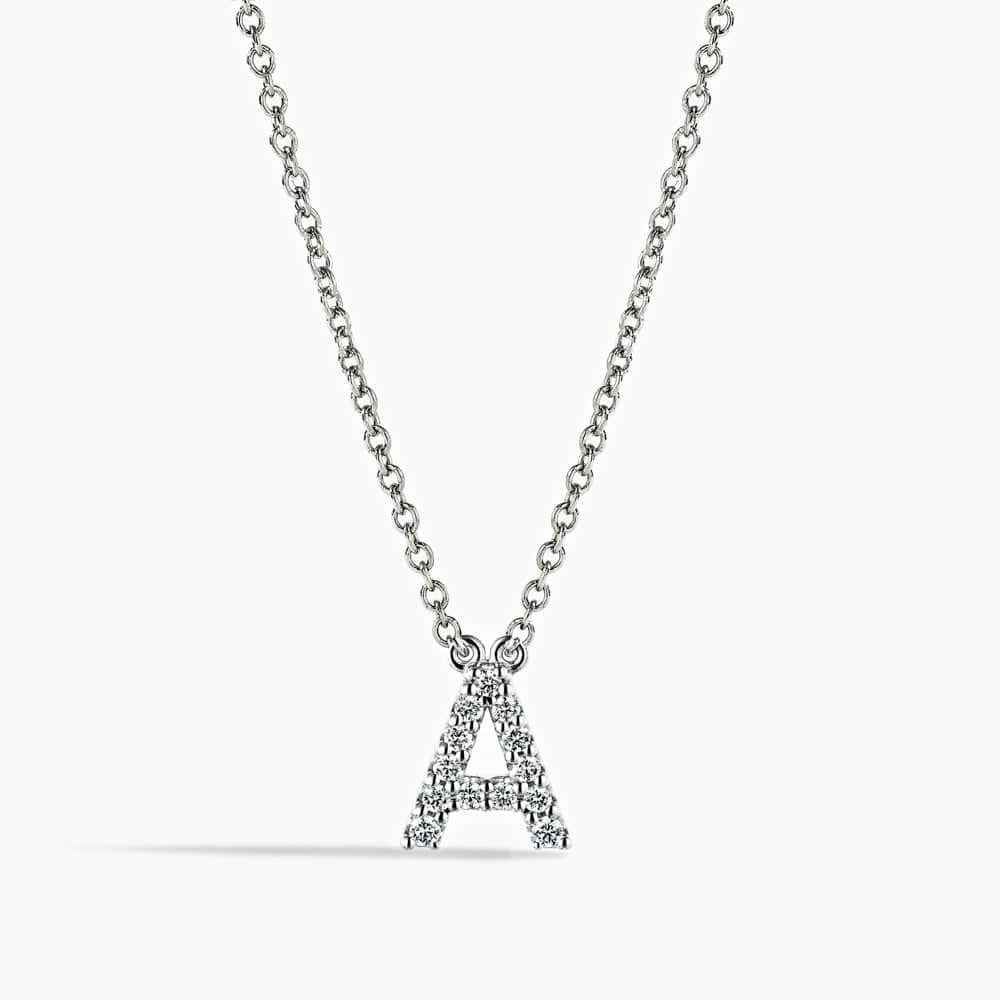 Initial necklace with 0.16ctw recycled diamonds in 14K white gold |diamond and gold initial necklace.