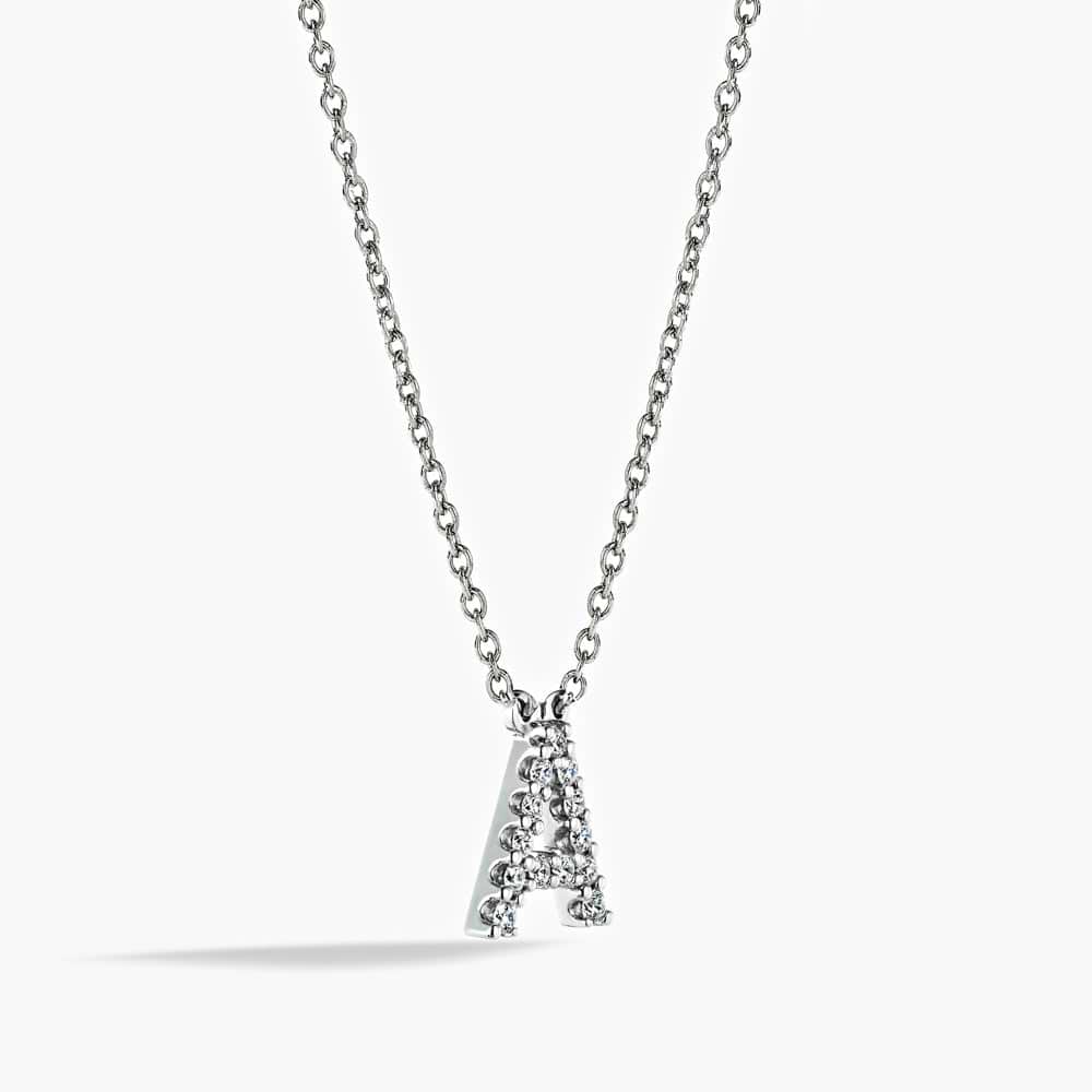 Initial necklace with 0.16ctw recycled diamonds in 14K white gold |diamond and gold initial necklace.