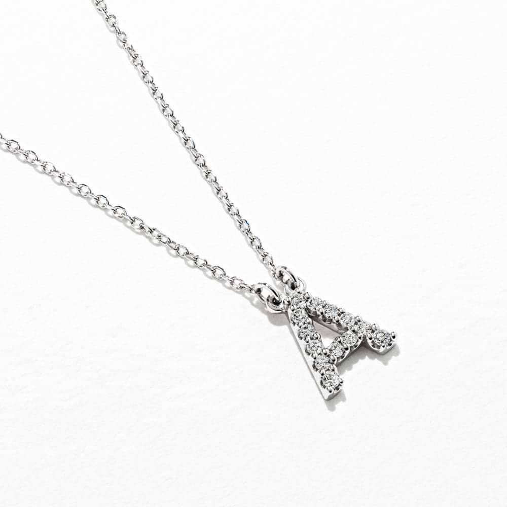 Initial necklace with 0.16ctw recycled diamonds in 14K white gold |diamond and gold initial necklace.