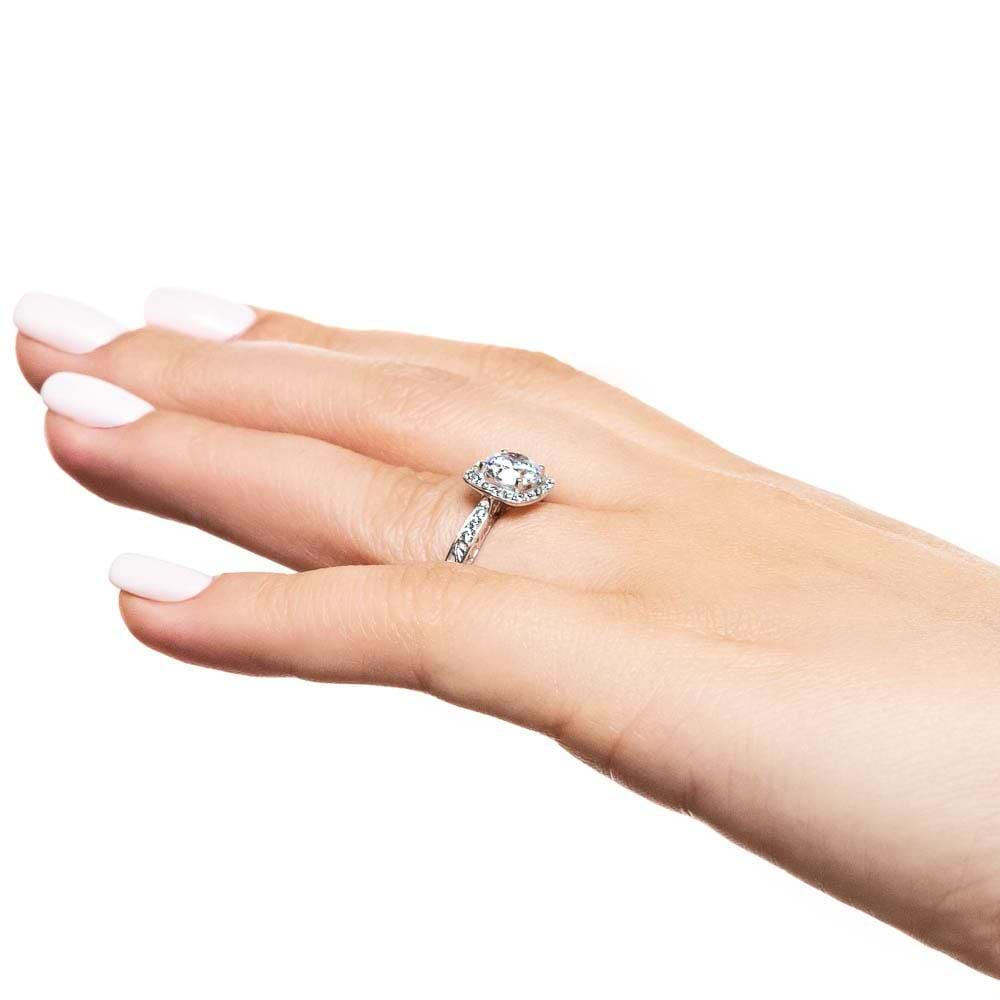 Shown with 1ct Round Cut Lab Grown Diamond in 14k White Gold|Antique filgree detailed ring with lab created diamond set in 14k white gold worn on hand sideview