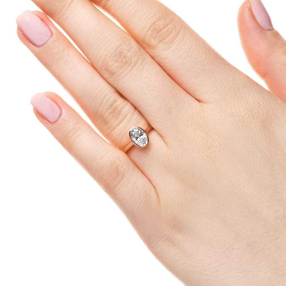 Shown with 1ct oval cut lab grown diamond in 14k rose gold