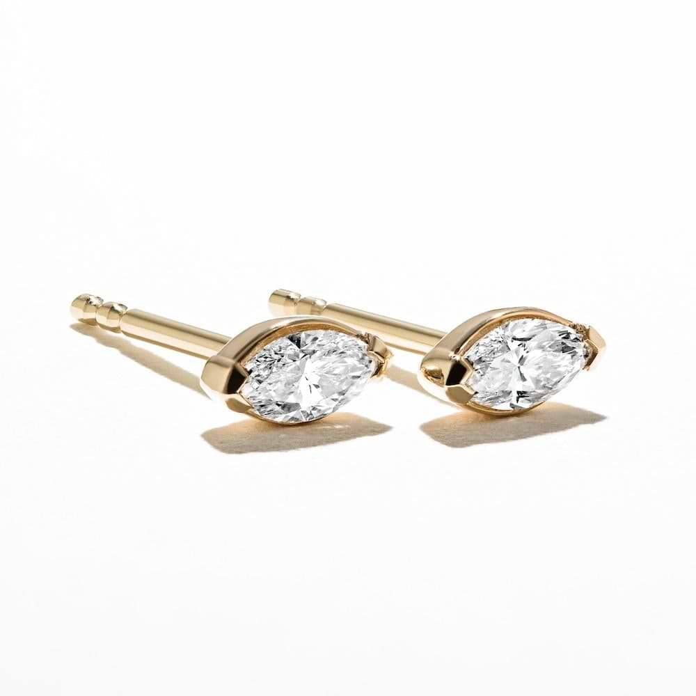 Shown in 14k Yellow Gold|Marquise Bezel Set Lab Grown Diamond Stud Earrings in 14k Yellow Gold