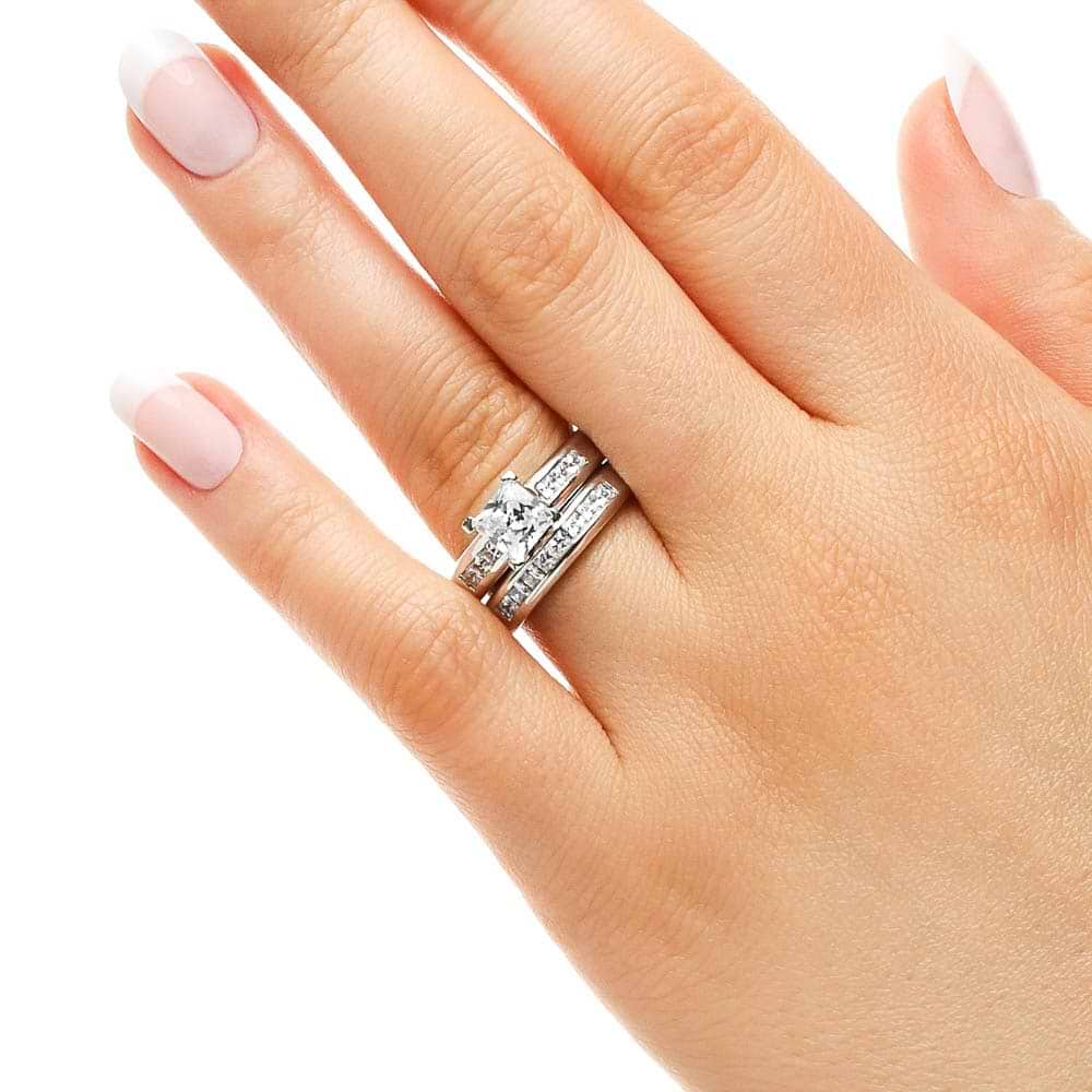 Melanie Wedding Set featuring a princess cut 1.50ct Diamond Hybrid® engagement ring in recycled 14K white gold with .30ctw side stones and a matching wedding band with .40ctw channel set stones | Melanie Wedding Set 1.50ct Diamond Hybrid engagement ring wedding band