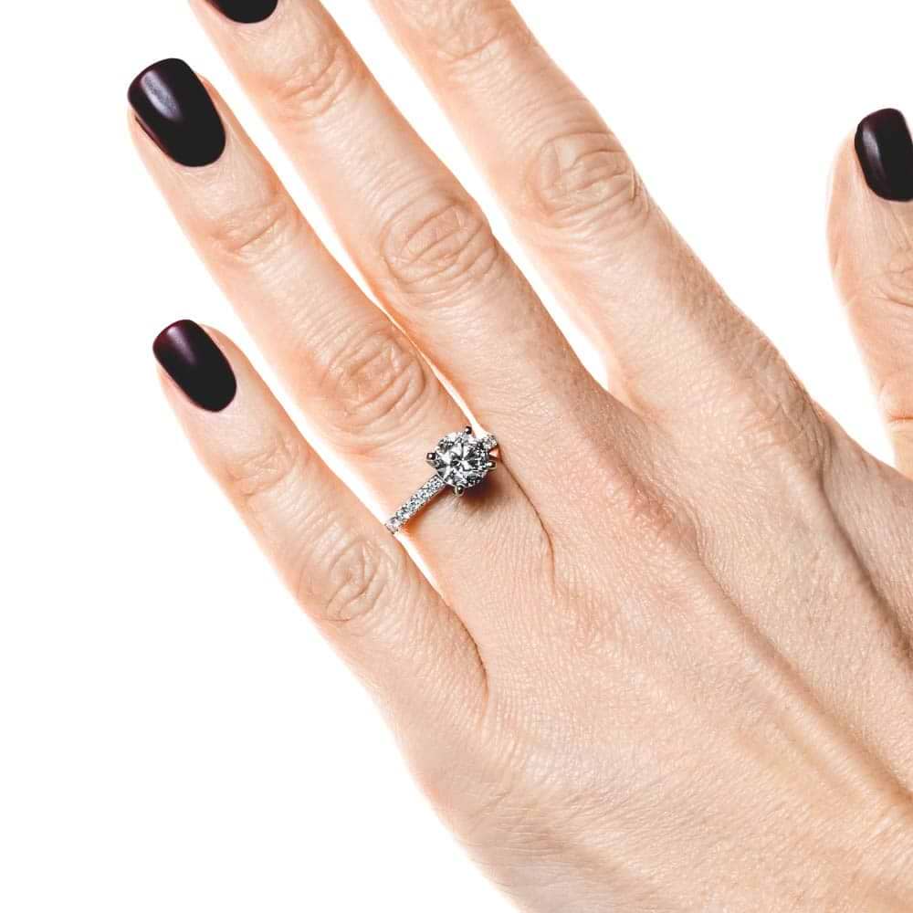 Shown with 1ct Round Cut Lab Grown Diamond in Platinum|Diamond accented engagement ring with 1ct round cut lab grown diamond in platinum setting worn on hand