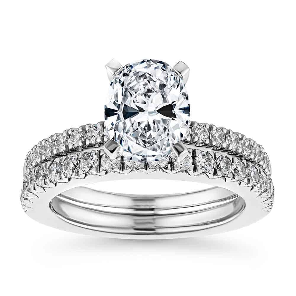 Novu Wedding Set shown with a 1.0ct Round cut Lab-Grown Diamond with a diamond accented band in recycled platinum, can be purchased with the matching band as a set at a discounted price 