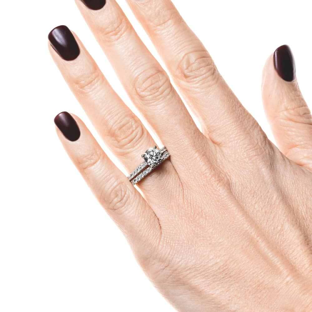 Novu Wedding Set shown with a 1.0ct Round cut Lab-Grown Diamond with a diamond accented band in recycled platinum, can be purchased with the matching band as a set at a discounted price | Novu Wedding Set Shown 1.0ct Round cut Lab-Grown Diamond diamond accented band in recycled platinum matching band