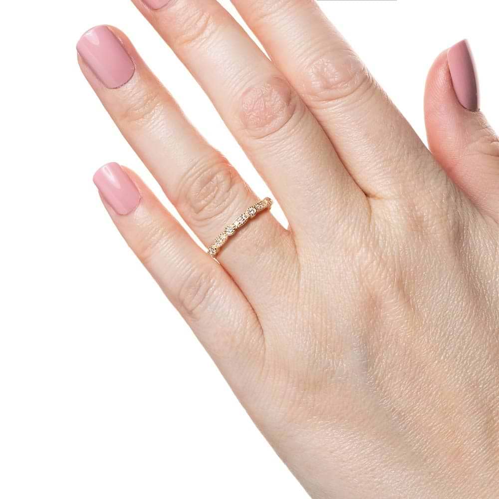 Diamond accented wedding band with filigree detail in recycled 14K yellow gold made to fit the Paris Engagement Ring 