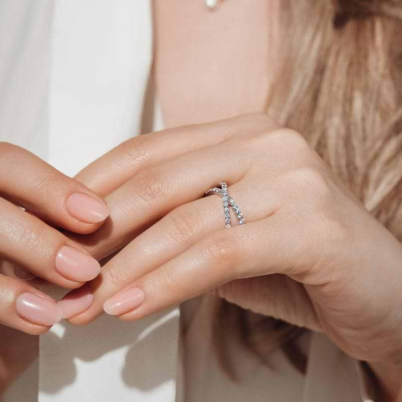 Diamond accented criss cross ring in recycled 14K white gold 