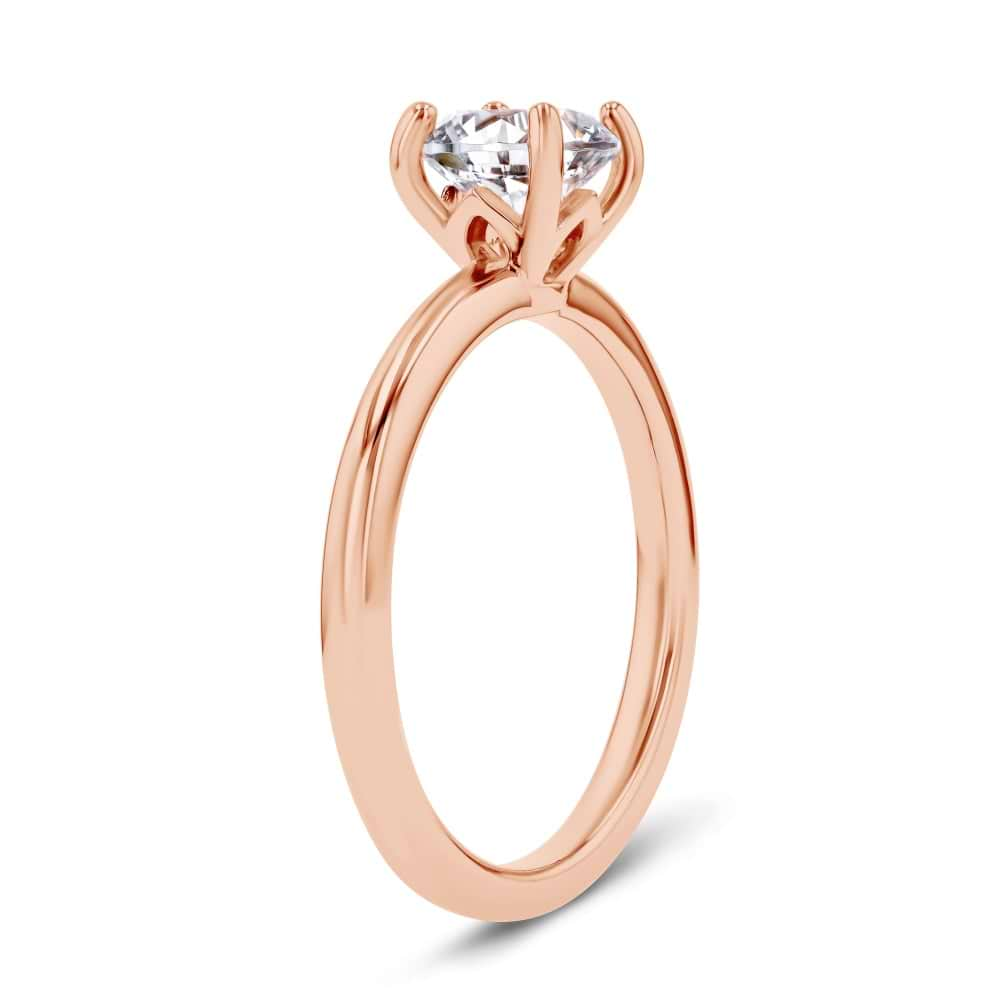 Shown here with a 1.0ct Round Cut Lab Grown Diamond center stone in 14K Rose Gold