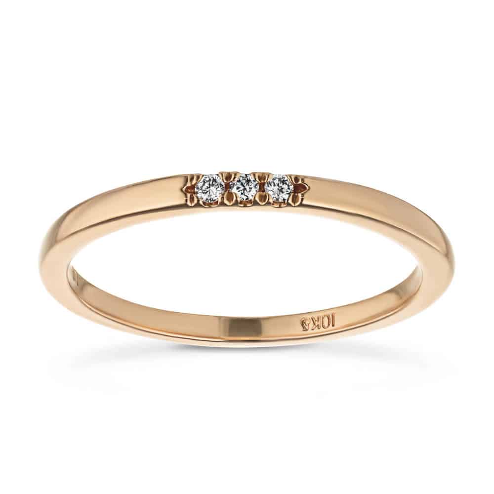 Three Lab-Grown Diamonds set in a simple band in recycled 10K rose gold 