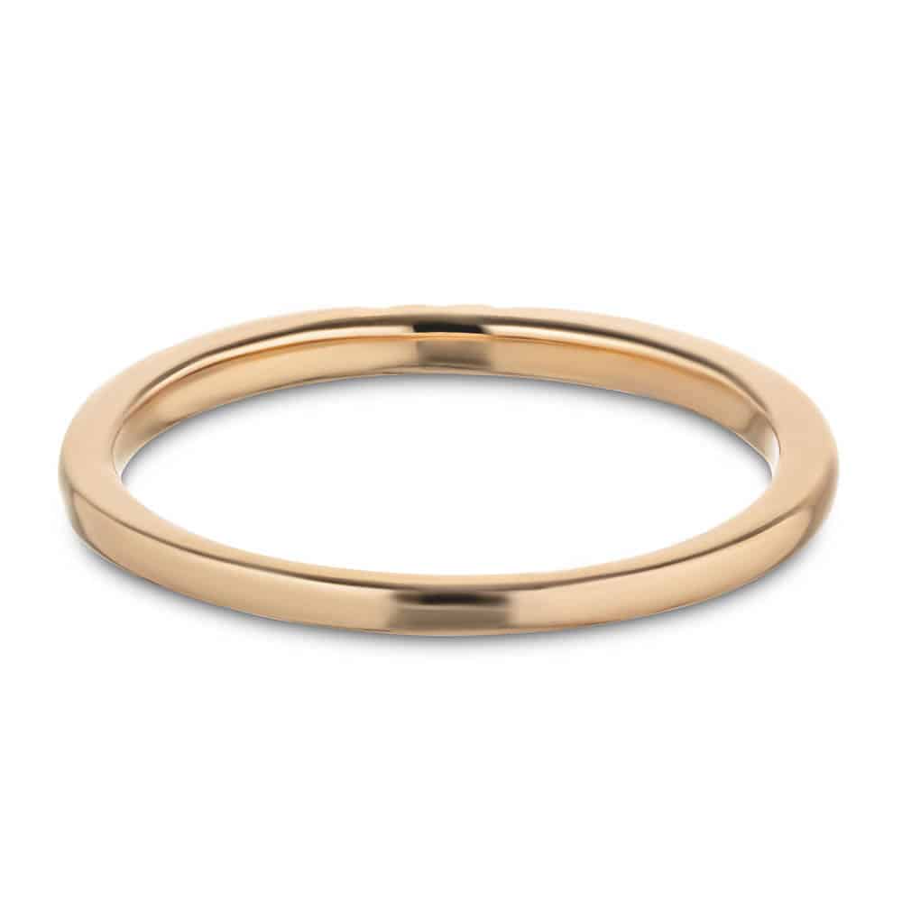 Three Lab-Grown Diamonds set in a simple band in recycled 10K rose gold 