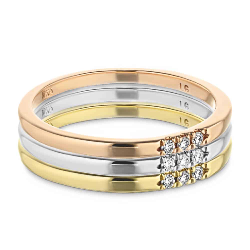 Three Lab-Grown Diamonds set in a simple band in recycled 10K rose gold, 10K white gold and 10K yellow gold, can be purchased as a set for a discounted price