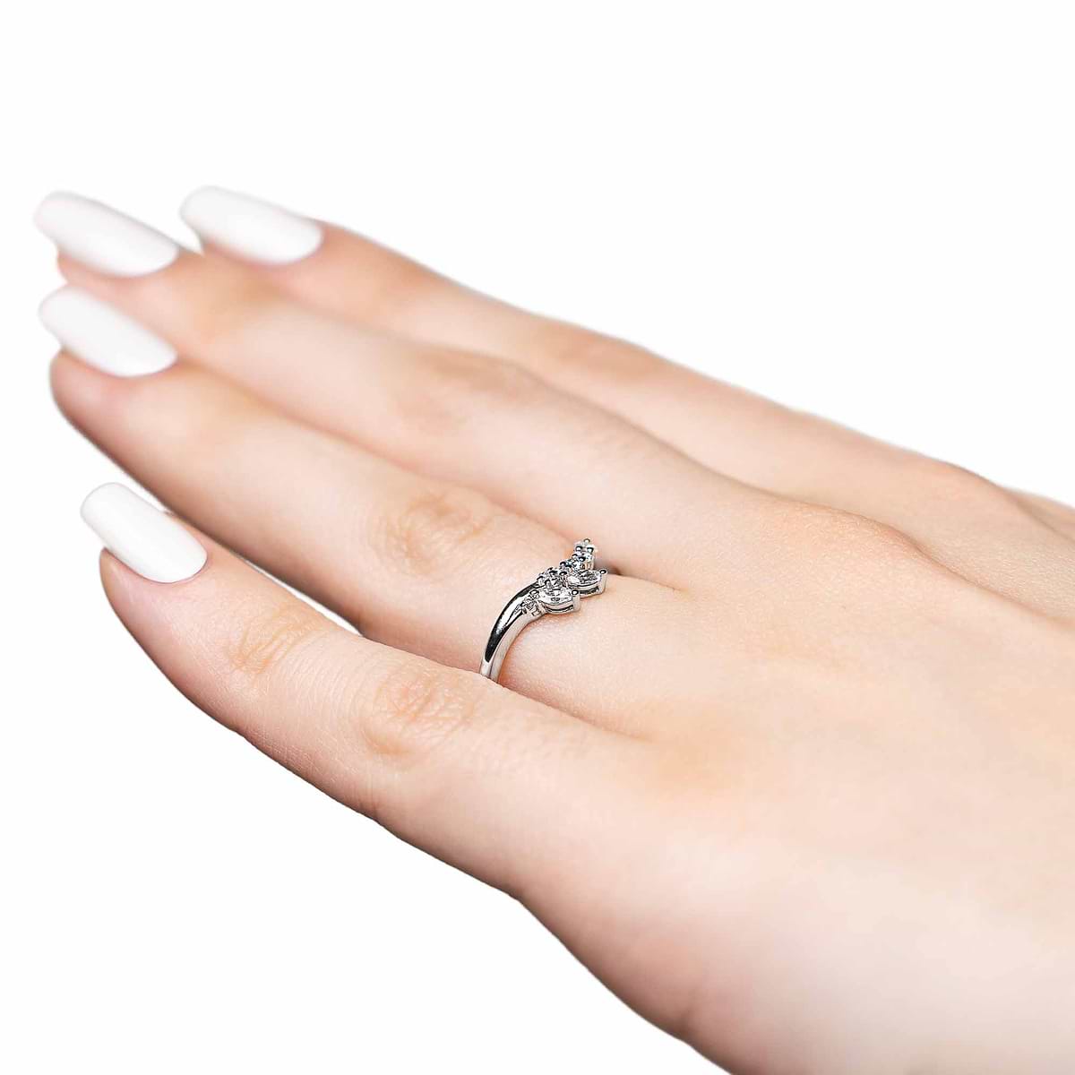 Shown in 14k White Gold|Unique diamond accented wedding band with asymmetrical design with accenting diamonds shown from side