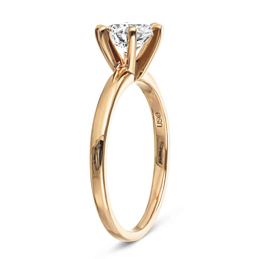 Shown here with a 1.5ct Round lab-grown diamond in a six prong rose gold setting. 