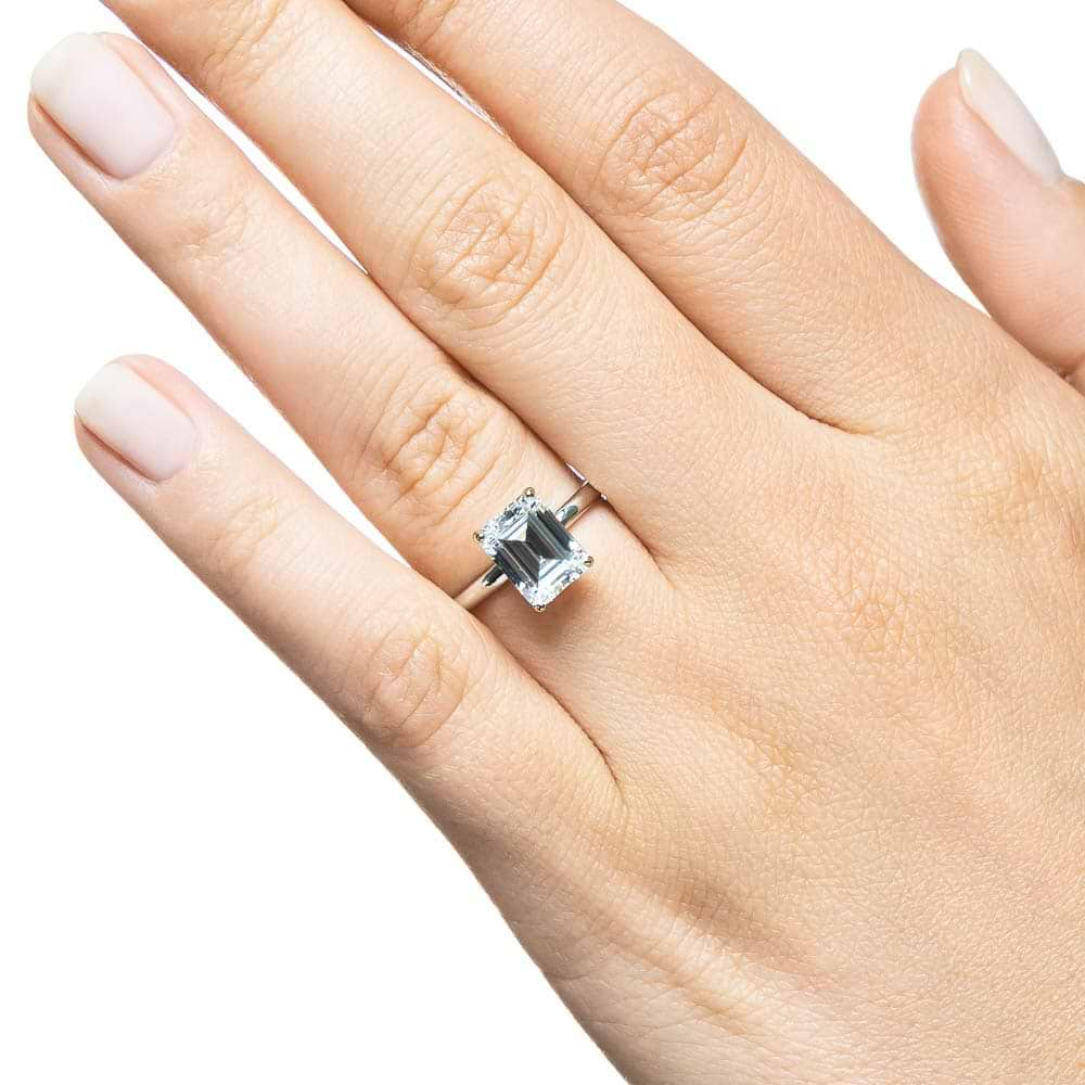 Shown with a 2.0ct Emerald cut Lab-Grown Diamond in recycled 14K white gold 