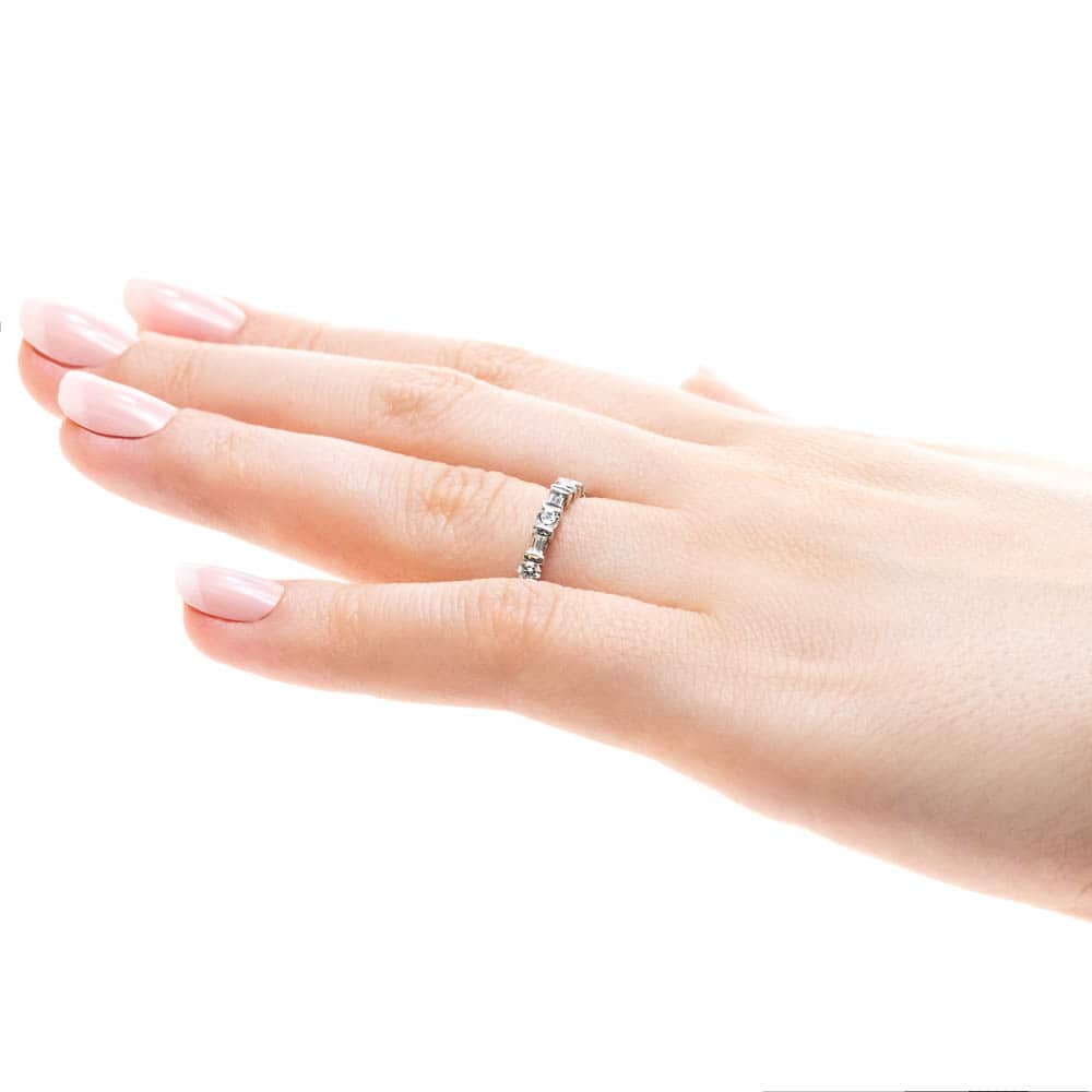 Whimsy Diamond Wedding Band with accenting round and baguette recycled diamonds in recycled 14K white gold | Whimsy diamond edding band accenting round baguette recycled diamonds recycled 14K white gold