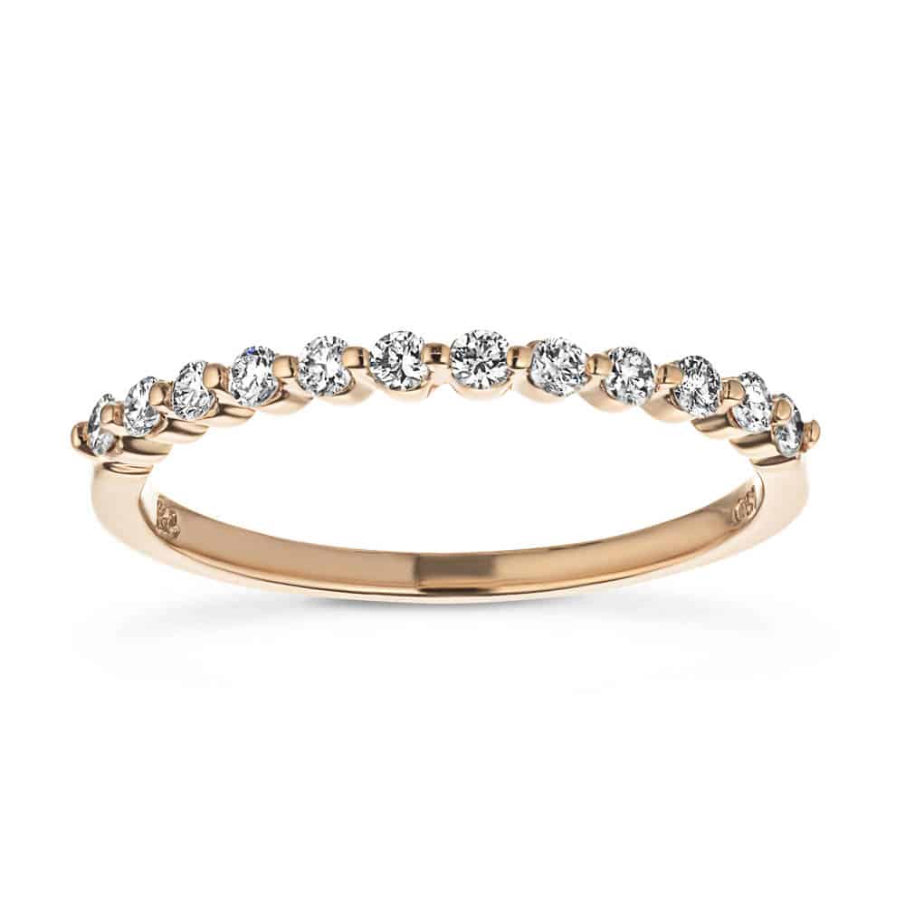 Diamond accented wedding band in recycled 14K rose gold 