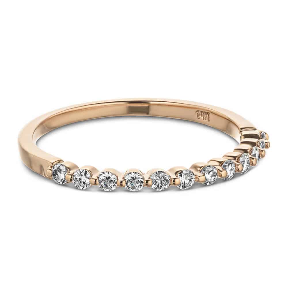 Diamond accented wedding band in recycled 14K rose gold 