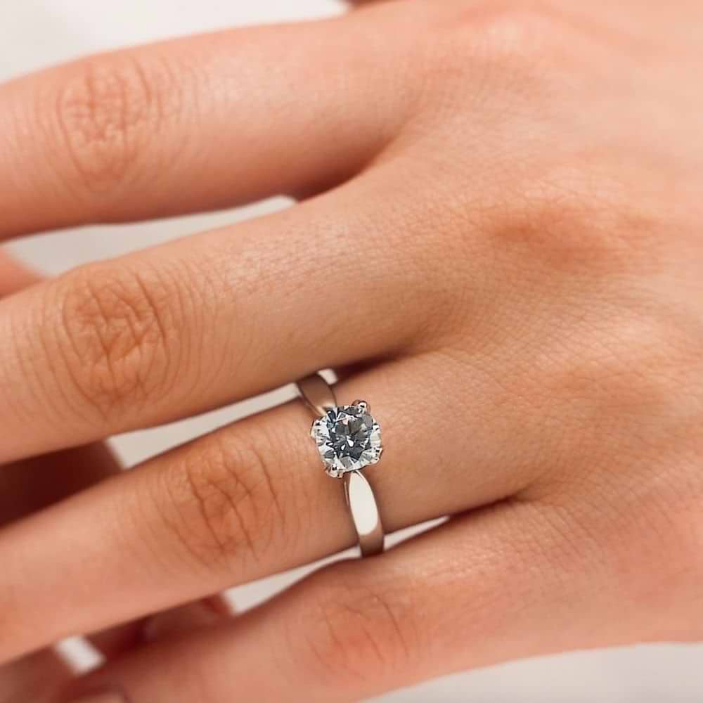 Winter Rose Engagement Ring shown with a 1.50ct round cut Lab-Grown Diamond in 14K rose gold| Winter Rose Engagement Ring 1.50ct round cut Lab-Grown Diamond 14K rose gold
