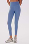 Rear view of a person wearing SPLITS59 Clare High Waist Rigor 7/8 leggings in Steel Blue/White and gray sneakers against a white background.