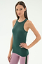 A woman poses with one hand on her hip, wearing the SPLITS59 Kiki Rib Tank Full Length - Military and mauve leggings with green stripe—ideal for yoga or running—against a plain white background.