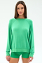 A woman wears the SPLITS59 Andie Oversized Fleece Sweatshirt in Spearmint, standing facing forward against a plain white background.