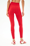 A person wearing SPLITS59 Airweight High Waist Legging in Pirate Red, made from soft Airweight fabric.