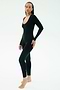 A person stands barefoot on a white background wearing the SPLITS59 Chloe Airweight Jumpsuit in black—a fitted, long-sleeve one piece with a scoop neckline, ideal for workouts or lounging.