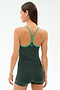 A woman is seen from the back wearing the SPLITS59 Airweight Tank in Military/Spearmint, paired with matching athletic shorts, set against a plain white background.