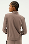 Seen from the back, a person with braided hair is wearing a taupe Max Rigor Track Jacket in Lentil/Black by SPLITS59, paired with matching Max Rigor Track Pants, set against a plain background.