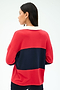A woman with long dark hair, seen from the back, wears the SPLITS59 Katie Fleece Rugby in Pirate Red/Indigo with a white collar.