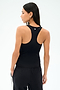 A person is shown from the back wearing the SPLITS59 Mel Airweight Lite Tank in black, paired with black pants, against a plain white background.