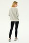 A person stands with their back to the camera, wearing a SPLITS59 Andie Fleece Sweatshirt in Heather Grey, black leggings made from stretch modal fabric, and gray sneakers, against a plain white background.
