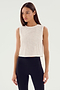 A person with long, straight hair wears the sleeveless *Logan Mesh Tank With Stripe - White* by SPLITS59 and black leggings. They stand against a plain, light-colored background.