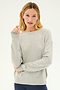 A person with blonde hair wearing the Sonja Fleece Sweatshirt in Heather Grey by SPLITS59 and dark pants, made in Los Angeles with ultra luxe fleece, stands against a plain background.