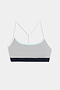 The SPLITS59 Emerson Airweight Bra in Dove Grey/Indigo features thin white straps, a light blue neckline trim, and a black elastic band—ideal for hot yoga or Pilates.