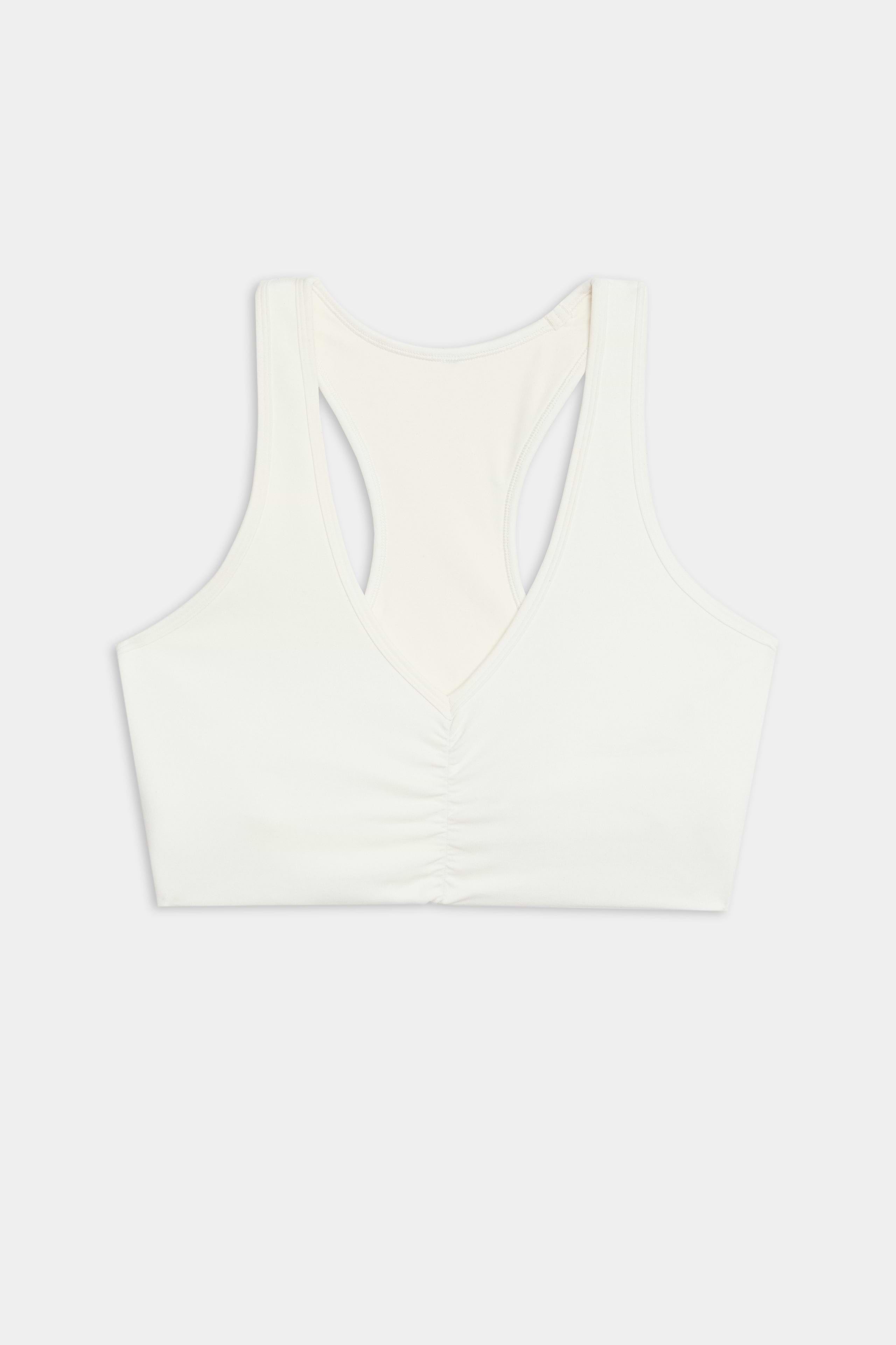 SPLITS59's Airweight Bra with Ruching in white, featuring gathered front detail, is shown against a plain backdrop.