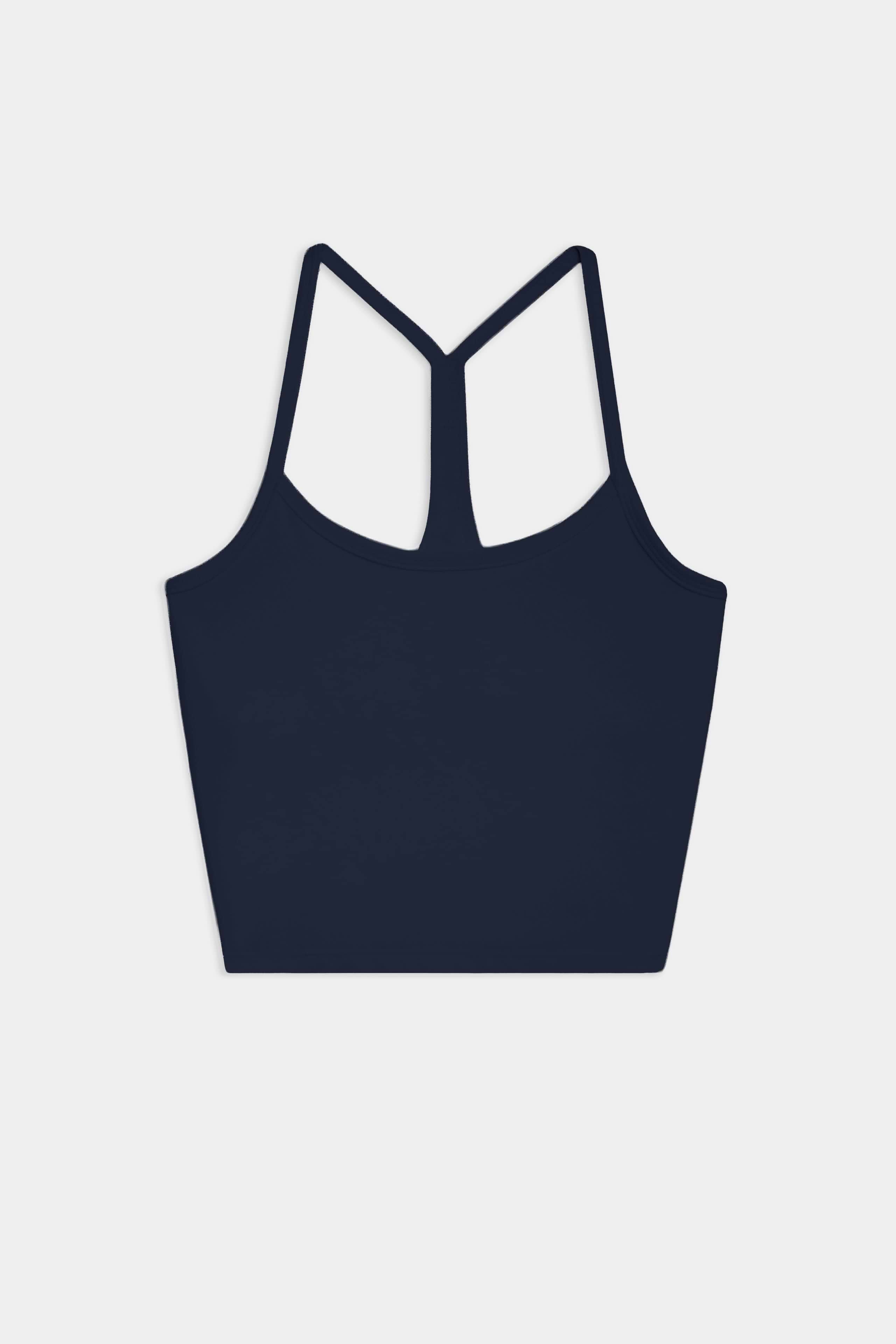The SPLITS59 Airweight Crop in Indigo, a racerback sports bra ideal for hot yoga, is shown on a plain white background.