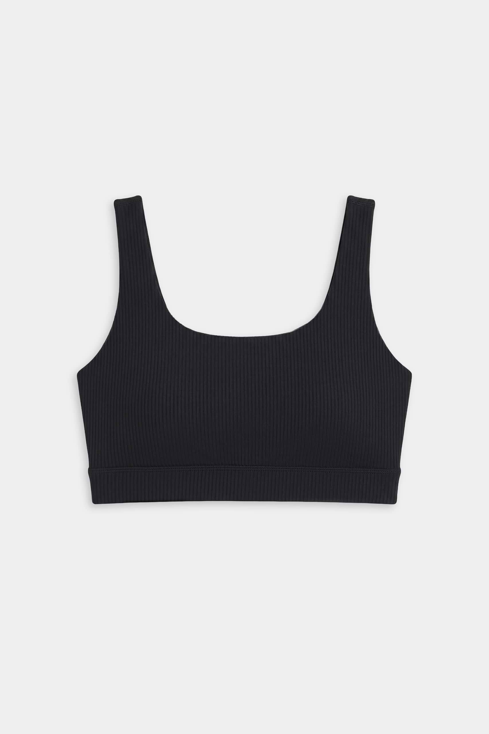 The SPLITS59 Airweight Rib Bra - Black features wide shoulder straps and a square neckline, crafted from moisture-wicking fabric—ideal for hot yoga—shown against a plain white background.