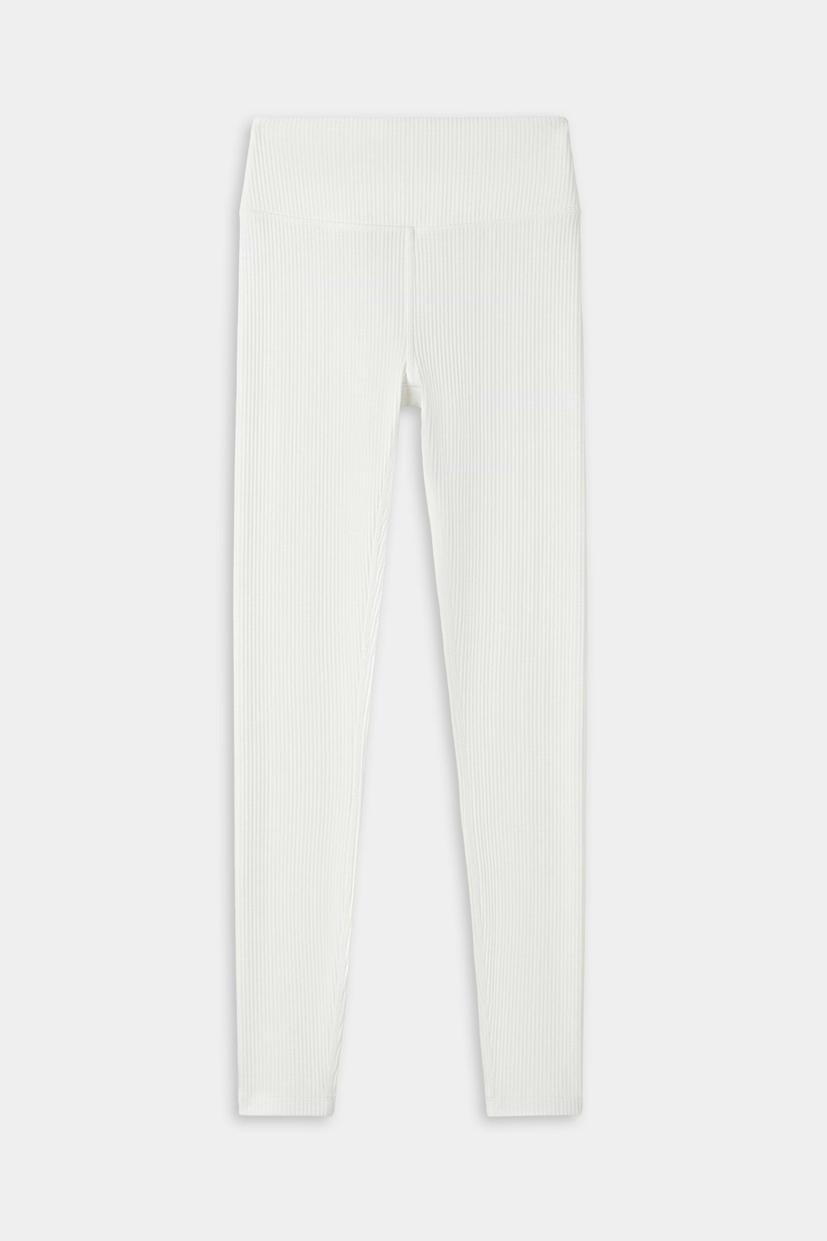 The SPLITS59 Airweight Rib High Waist 7/8 leggings in white are shown flat on a plain background—ideal for Pilates or hot yoga sessions.