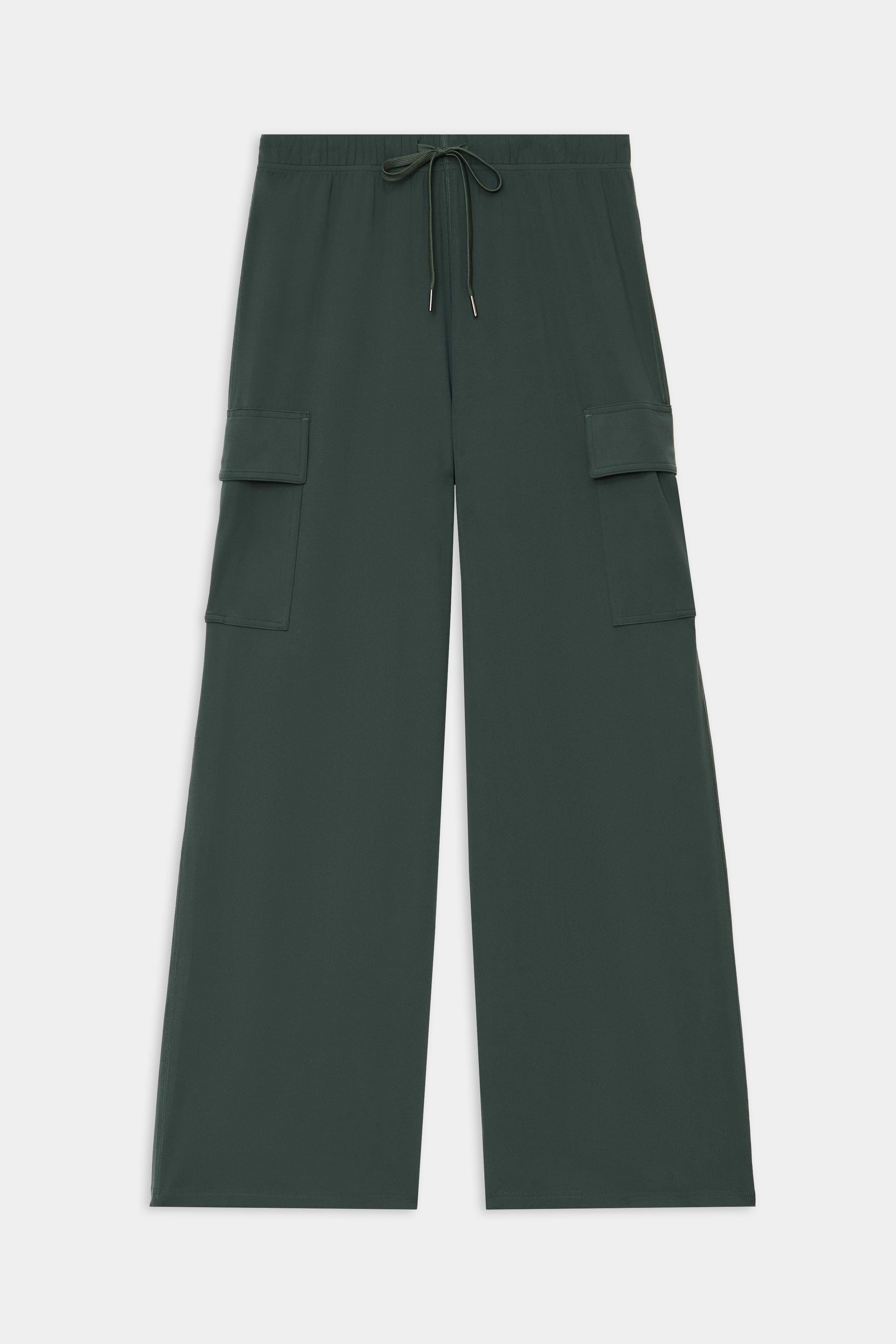 The SPLITS59 Alex Airweight Cargo Pant - Military features dark green wide-leg nylon-spandex fabric, an elastic drawstring waistband, and large side pocket flaps, displayed flat on a white background.