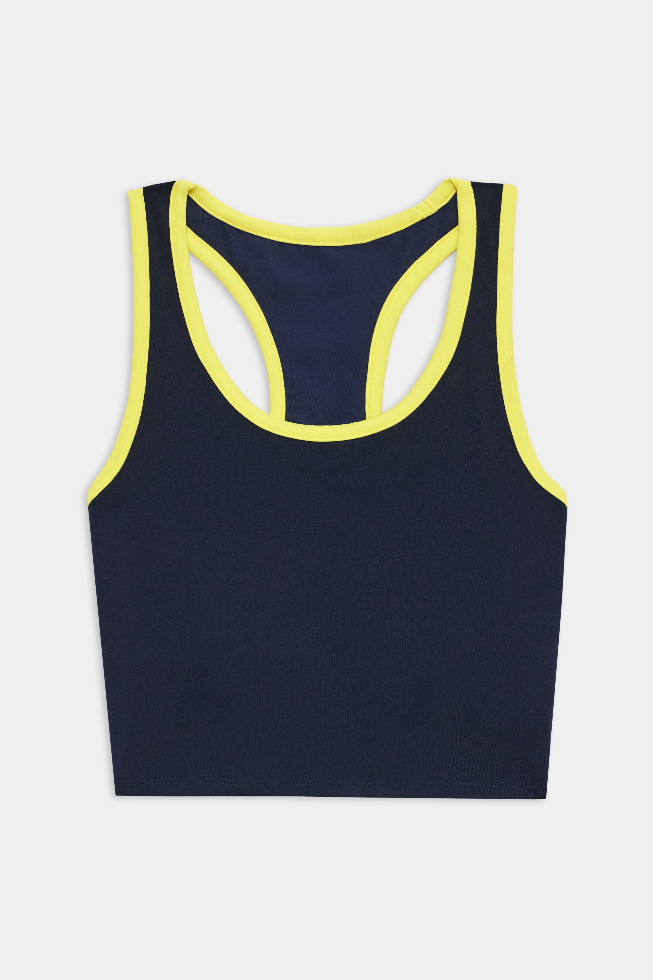 The SPLITS59 Amber Airweight Bralette in Indigo/Ray features a navy blue scoop-neck racerback design with yellow trim, made from Airweight performance fabric—perfect for hot yoga. Shown on a white background.