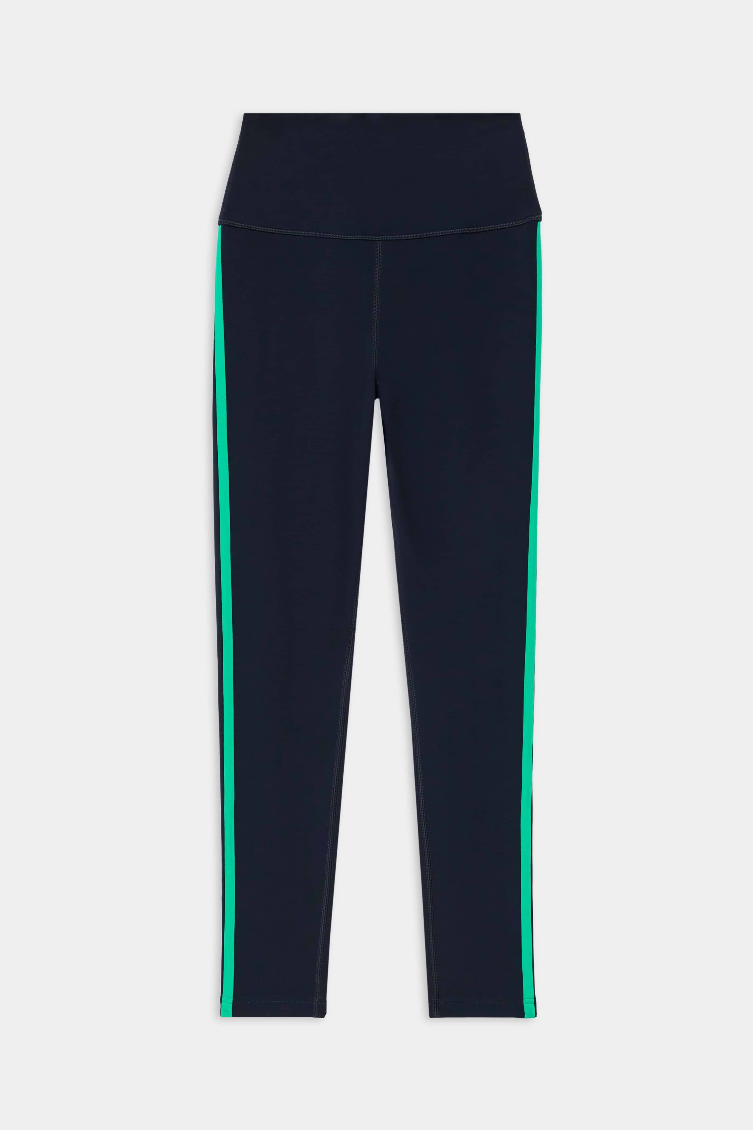 The SPLITS59 Amber Airweight High Waist 7/8 leggings in Indigo/Spearmint feature a high waistband, green vertical side stripes, and are made from a stretchy nylon-spandex blend, shown flat on a white background.