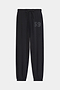 The SPLITS59 Andie Oversized Fleece Varsity 59 Sweatpant in Black features an elastic waistband, adjustable drawstring, elastic cuffs, and "59" embroidery—crafted in Los Angeles for cool weather workouts.