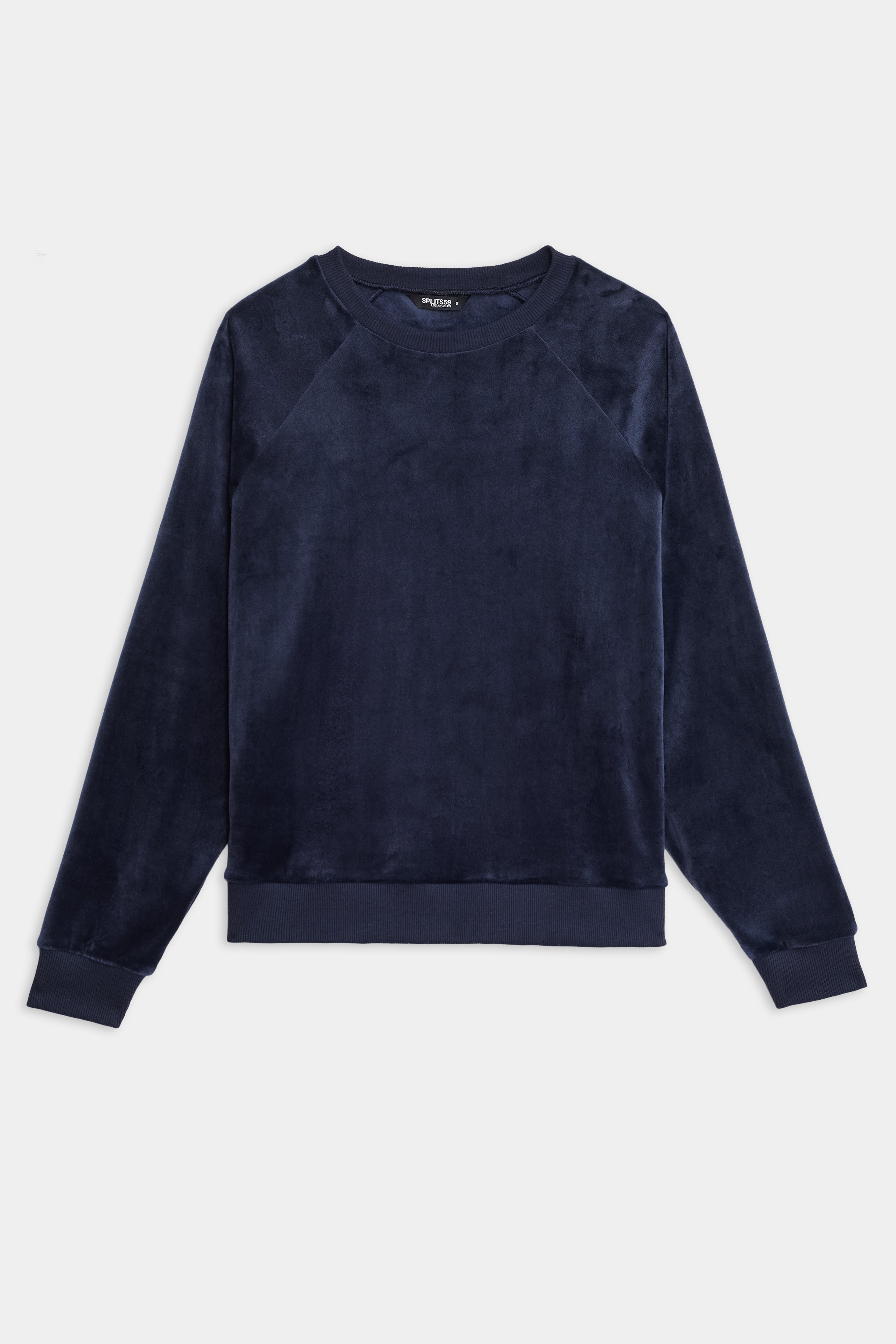 The SPLITS59 Joy Velour Crewneck is a navy blue, long-sleeve sweatshirt with a crew neck and soft velvety fabric, shown laid flat on a white background.