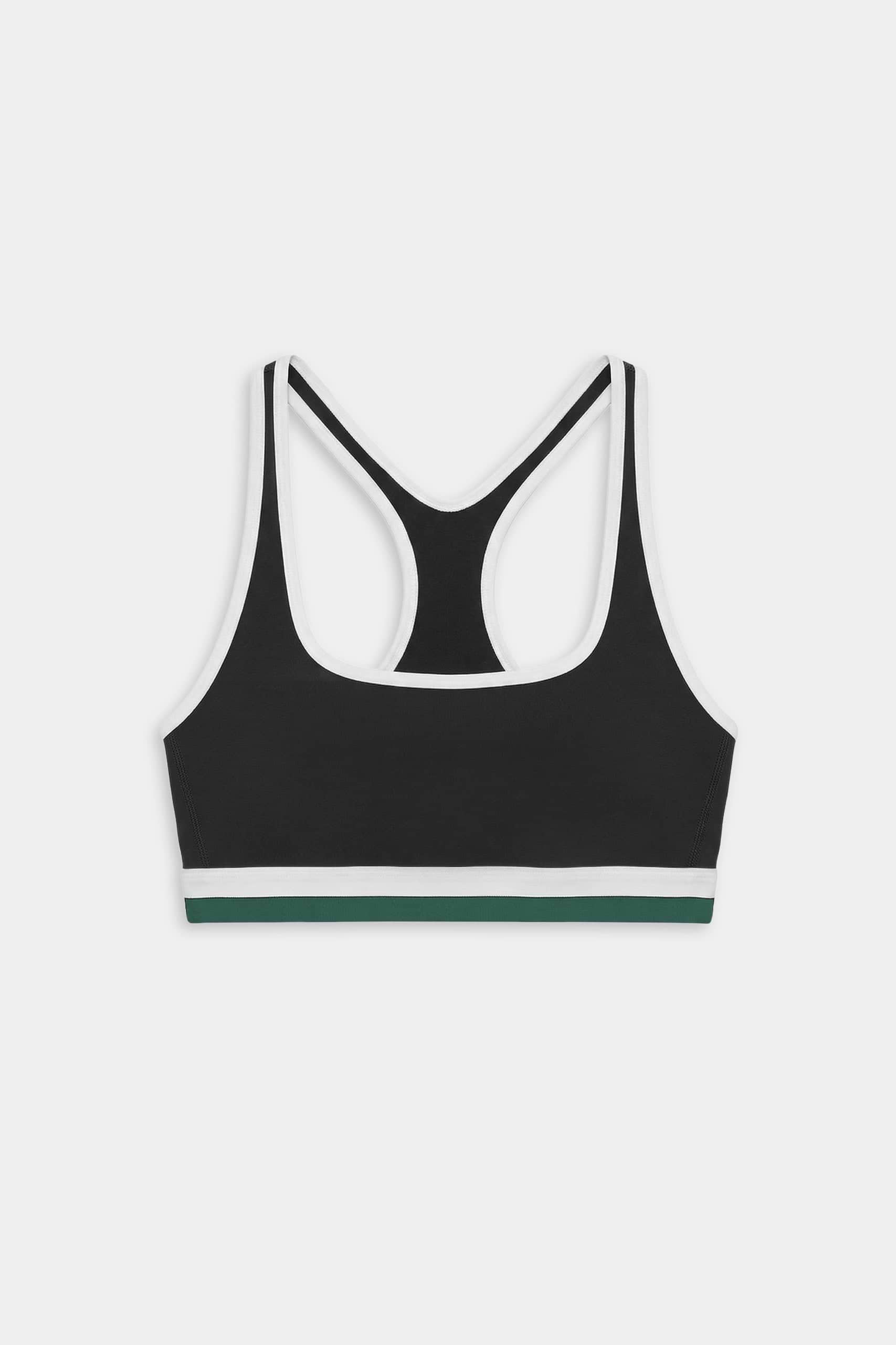 The SPLITS59 Bianca Rigor Bra - Black/White features a racerback design, white trim, and a green stripe on the bottom band, ideal for high-impact workouts. Shown on a plain white background.