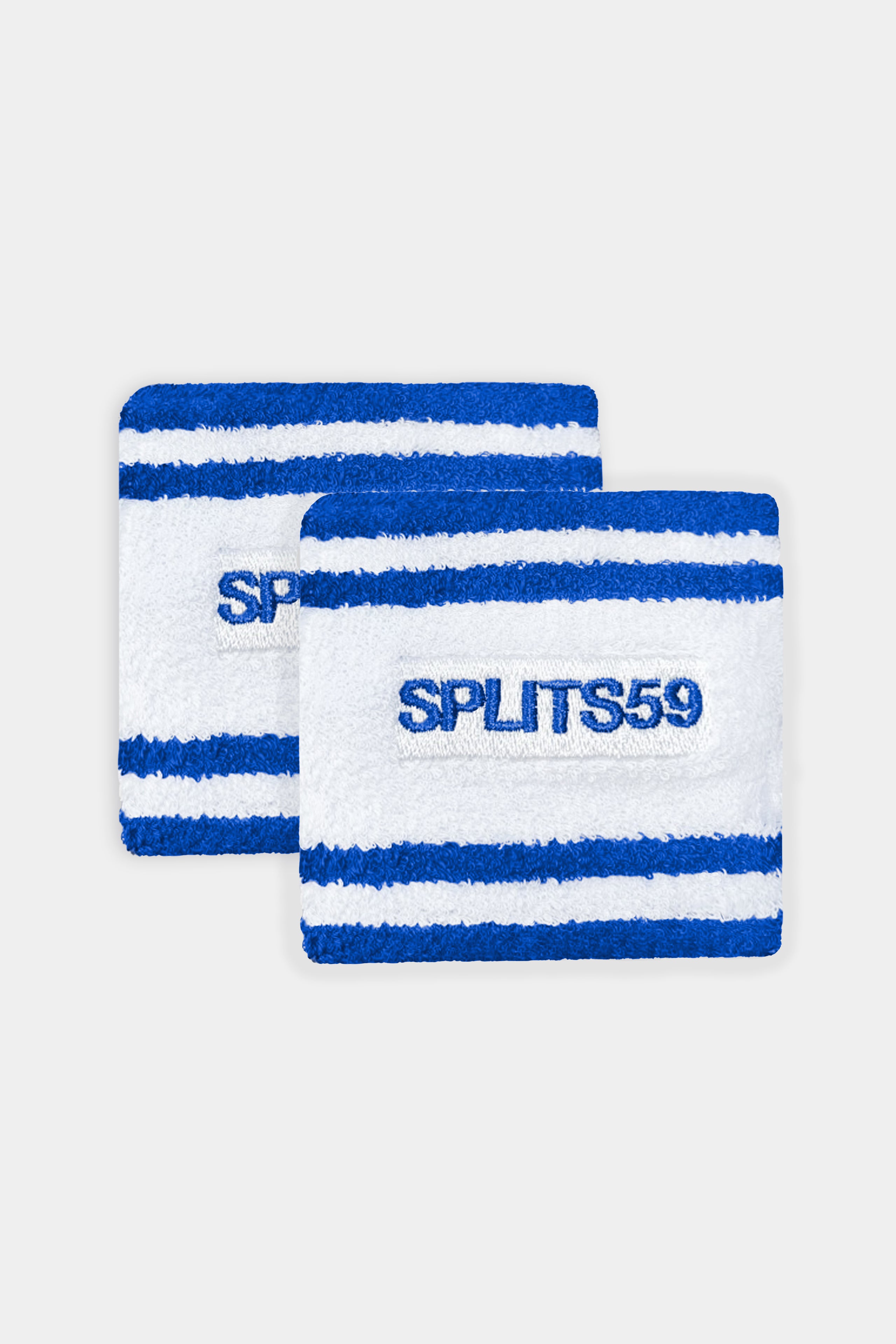 Two SPLITS59 WRISTBAND SET - White/Blue absorbent wristbands placed against a white background.