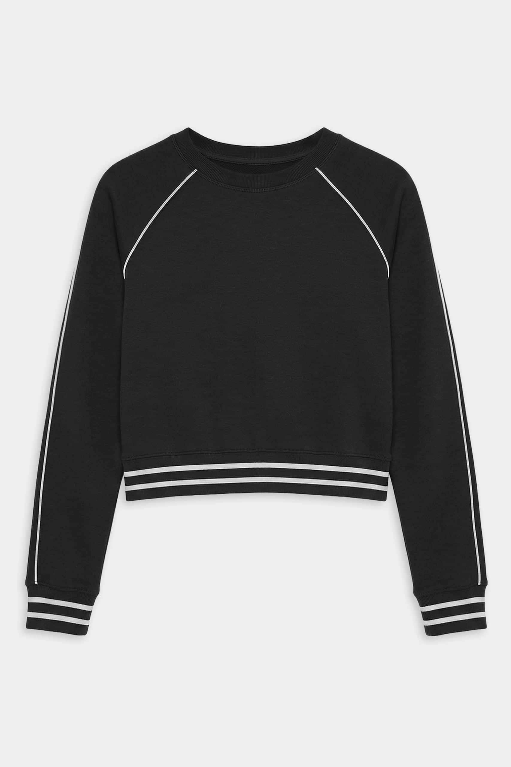 The SPLITS59 Brooks Fleece Sweatshirt With Stripe in Black/White features a long-sleeve crewneck cropped design, white piping on the sleeves, and white striped ribbed cuffs and hem.