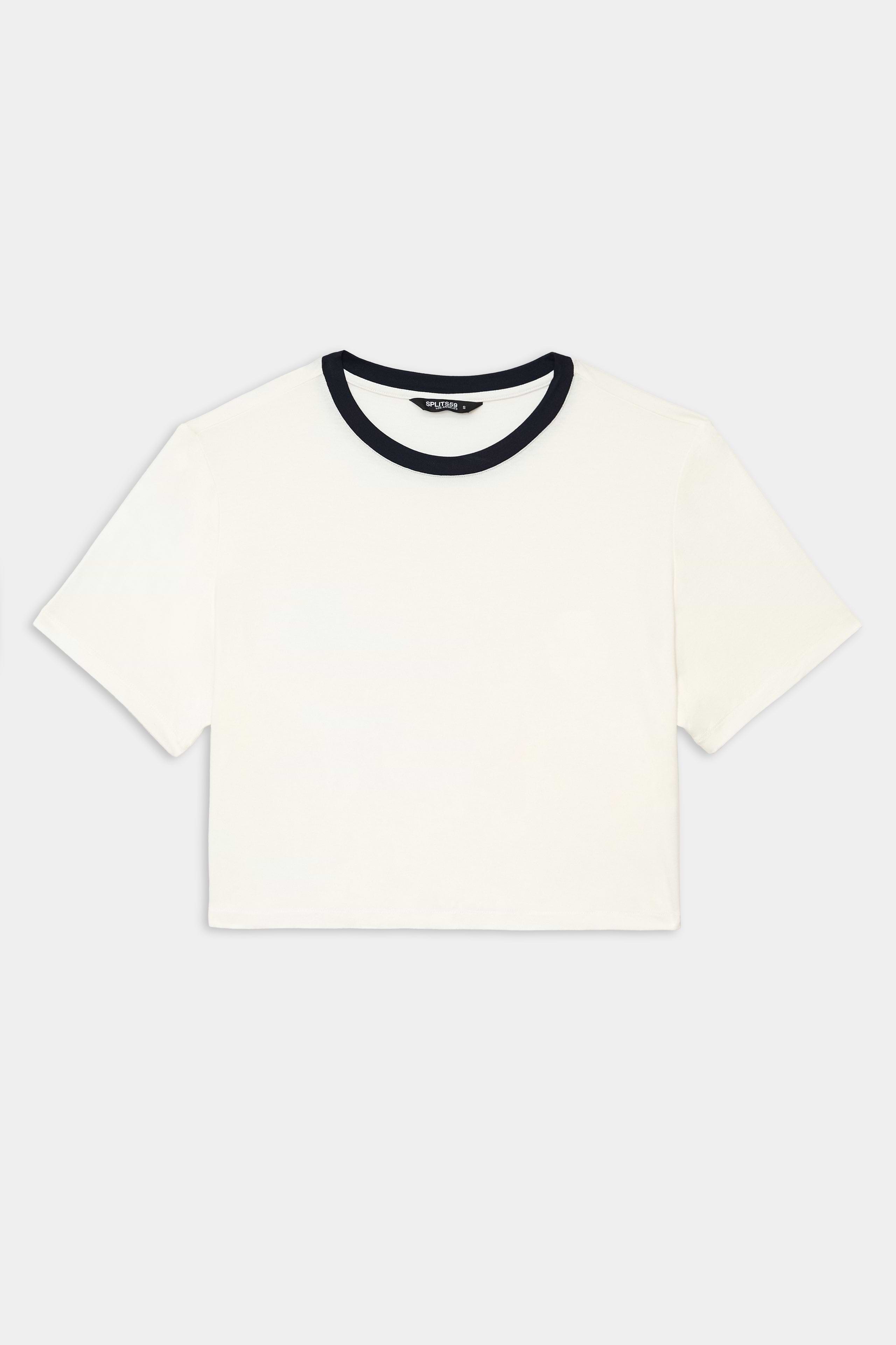 The SPLITS59 Djuna Crop Ringer in White/Indigo is a short-sleeve crop top with a contrasting indigo crew neckline, ideal for gym workouts or CrossFit, shown laid flat on a white background.