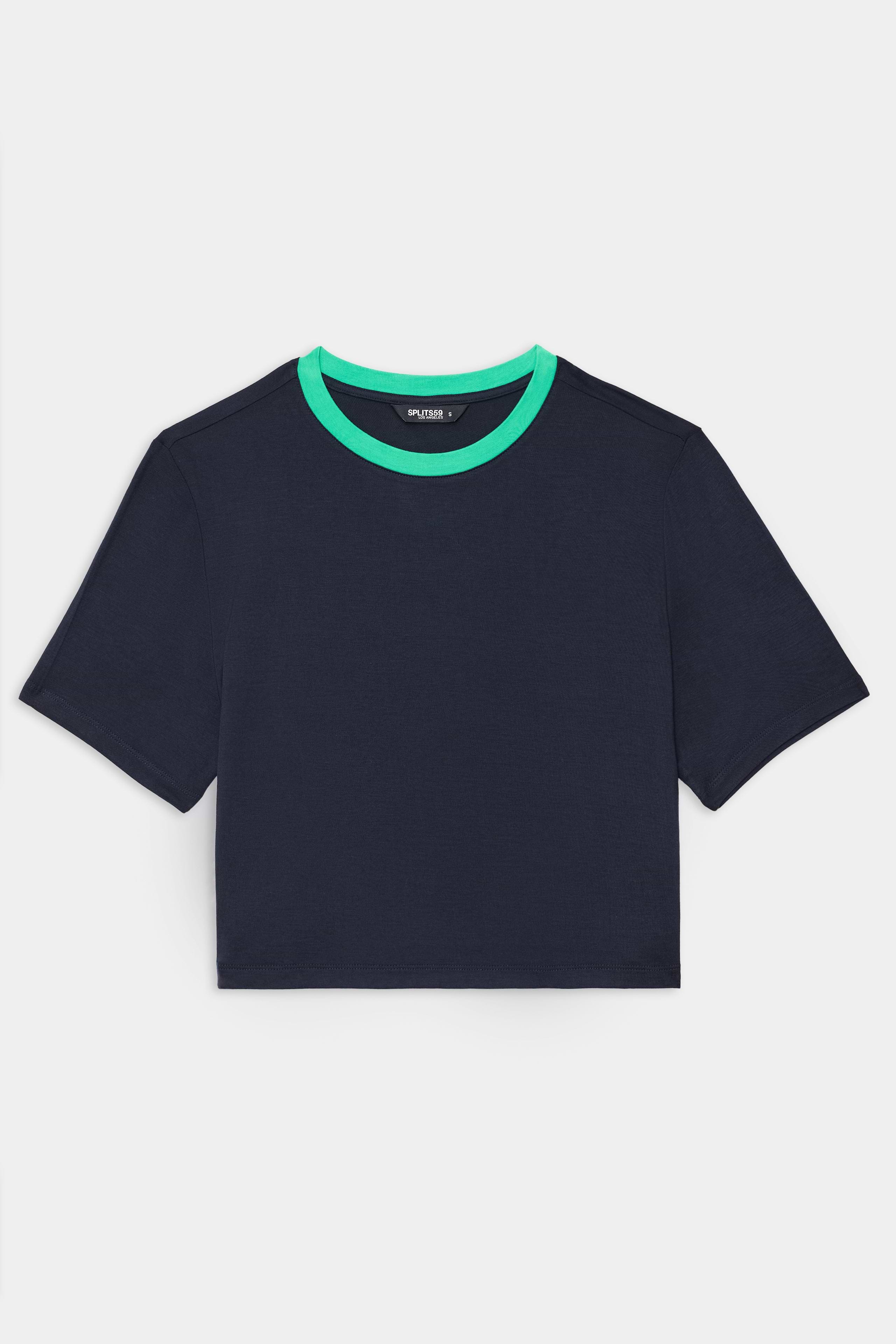 The SPLITS59 Djuna Crop Ringer in Indigo/Spearmint is a short-sleeve crop top featuring a bright green crew neckline, made from a soft viscose-elastane blend and shown on a white background.